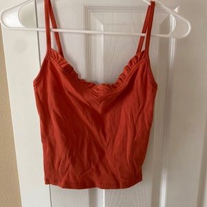orange tank top